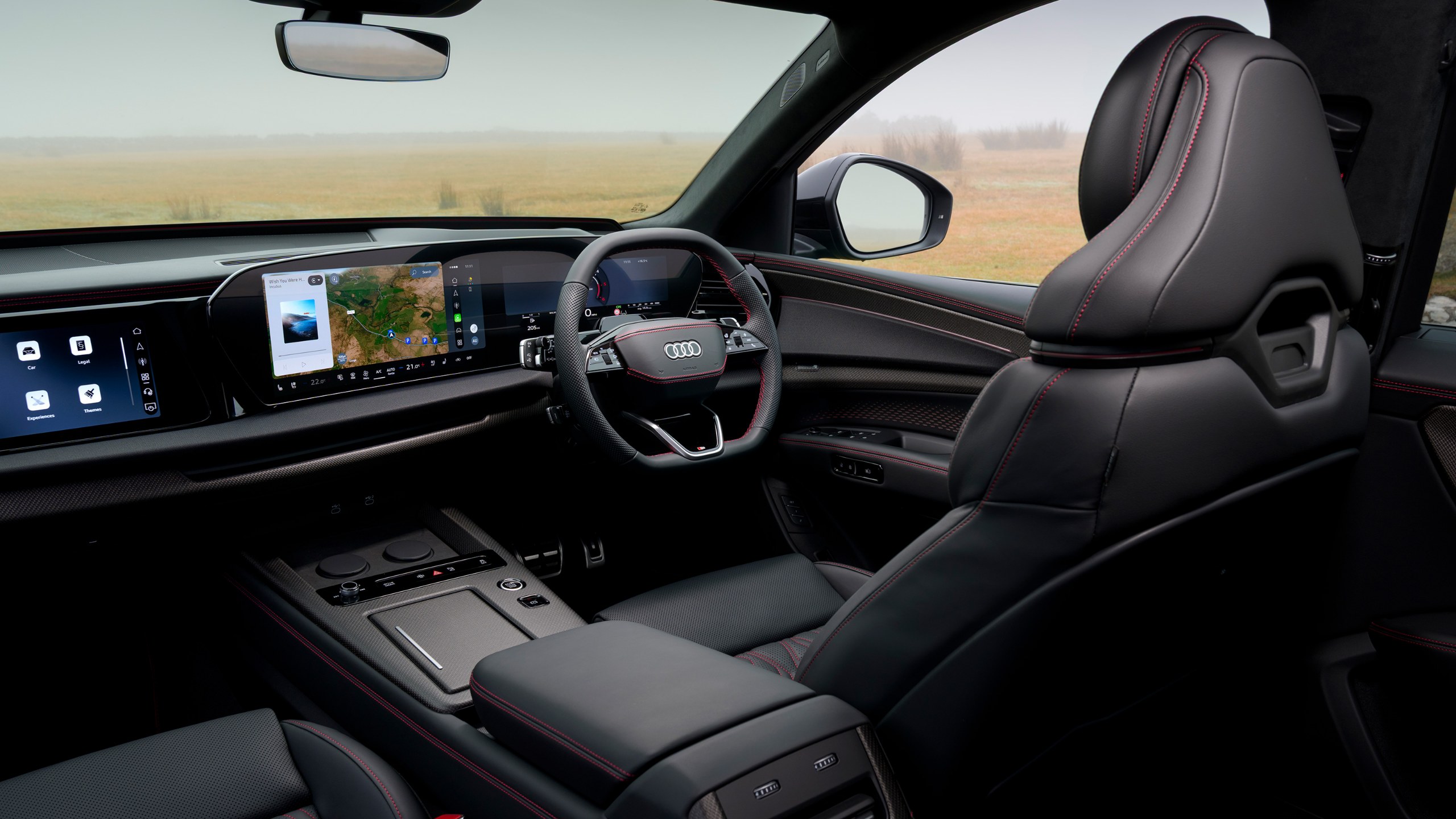 Yeni Audi Q7 Türkiye’ye Gelecek mi? 2027 Model Motor ve Teknolojiler Audi Q7 ön koltuklar ve kabin